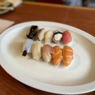 a plate of sushi on a table