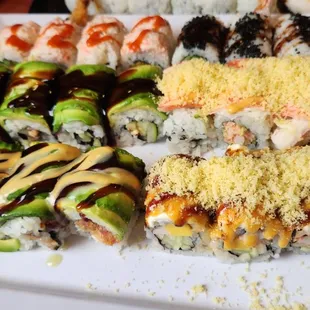 a variety of sushi and rolls