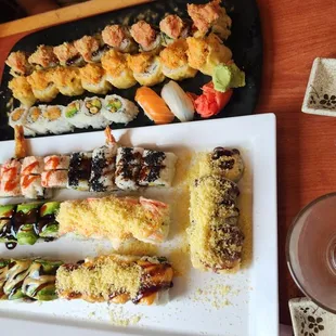 various types of sushi on plates