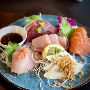 a plate of sushi on a table