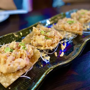 a plate of sushi on a table