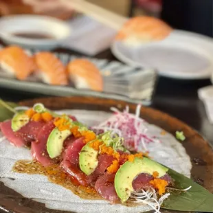 a plate of sushi on a table