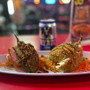 a plate of sushi culiacan and a can of soda