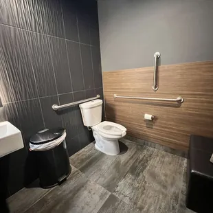 Clean clean!! Thoughtful bench placement too. One of the best bathrooms ever!