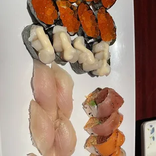 Left: Salmon Egg (so gross but my friend loved), scallop (premium), top right: Ex Boyfriend Roll, yellowtail