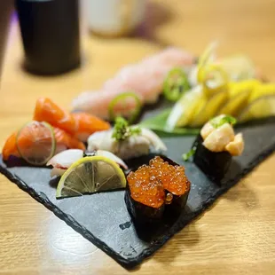 Salmon Sashimi, mackerel, octopus, Spicy Scallops Sashimi, Ikura Sashimi, Ebi Sashimi
