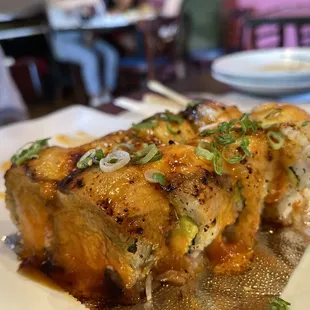 *FOOD POISONING* Baked Hamachi Roll. Tastes good. But both of us got sick that night and the next day.