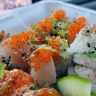 a close up of a plate of sushi