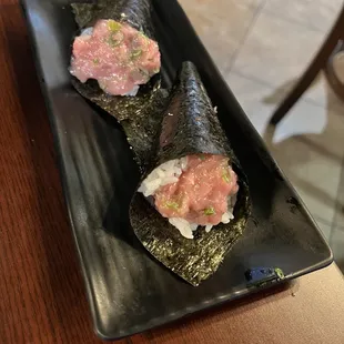Complimentary Toro hand roll from the chef. Thank you!!