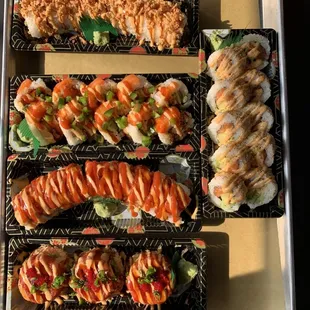 From top to bottom: dojo crunch, one inch punch, dynamite, and GF "legendary 41" tartare towers. On the right is spicy salmon