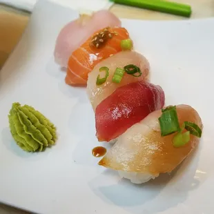Nigiri (Part of Combo A) All rice w/ paper thin cuts of fish. ($17)
