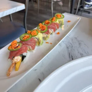 a plate of sushi on a table