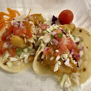 Fish tacos $4.50 each.  A little small