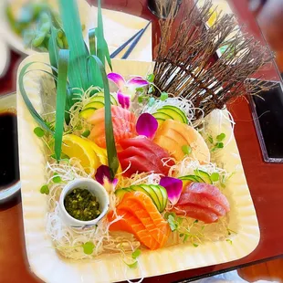 a plate of sushi on a table