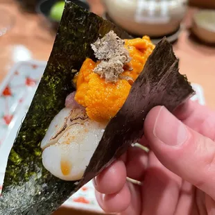 Hokkaido scallops with minced toro and uni, topped with black truffles