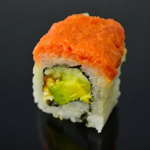 a sushi roll with avocado