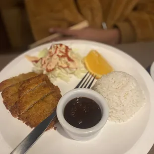 Tonkatsu- breaded and deep fried pork cutlet served with rice and a small salad. The kid orders this every trip and is never disappointed
