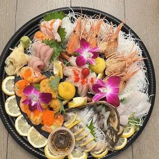 a platter of seafood and vegetables