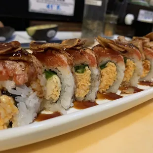 Fire in the roll
In: spicy crab, jalapeno
Out: seared tuna, fried garlic