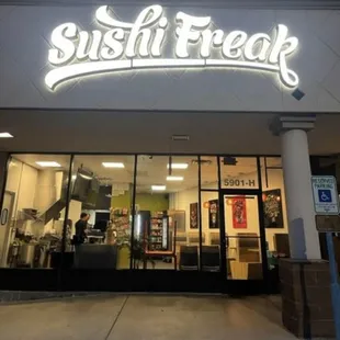 the front entrance of a sushi freak restaurant
