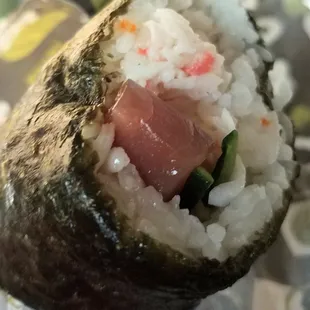 Sushi burrito = worlds biggest sushi roll.  No chopsticks required.