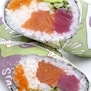 two pieces of sushi on a white background