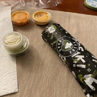 Kookmeyer burrito glory with their main sauce + fire sauce