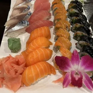 (Top left to right) Mackerel nigiri, tuna nigiri, salmon lover roll, Spider Roll, salmon nigiri
