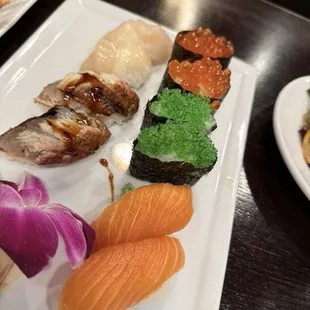 Salmon, unagi, tobiko, Ikura, scallop nigiri