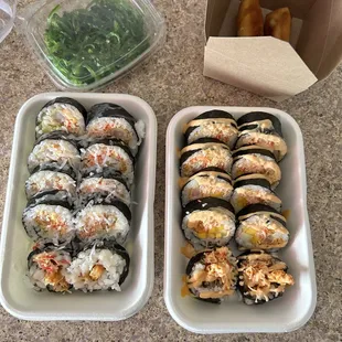 Seaweed salad, spring rolls, sushi