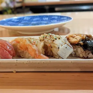 a variety of sushi on a plate