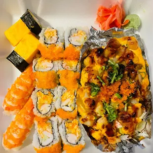 Tamago Egg Sushi (upper left); Shrimp Sushi (bottom left); Mexican Roll (middle); Scallop Lover Roll (right)!