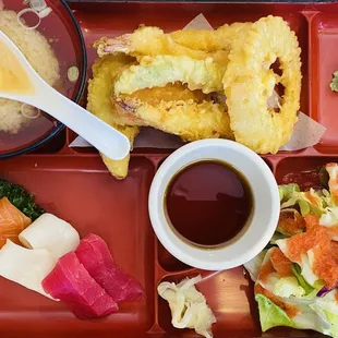 Bento Box special choice of 2 entrees and choice of 2 sides $22.99 plus $2.00 for choosing sushi or sashimi.