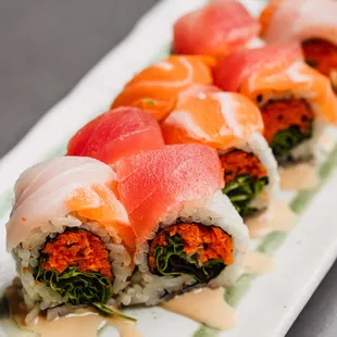 a plate of sushi rolls