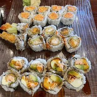 Combo 1 Crunchy spicy Krabmeat roll, shrimp tempura roll, salmon Katsu roll