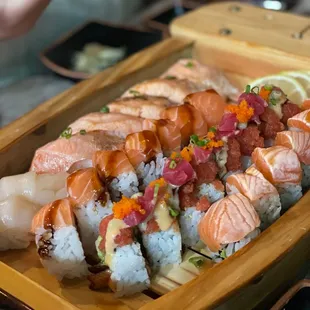 Scallop nigiri, salmon belly nigiri, Samurai Roll, Geisha Roll, Salmon Torched Roll