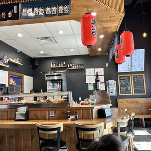the interior of a sushi restaurant