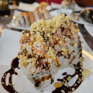a piece of sushi on a plate