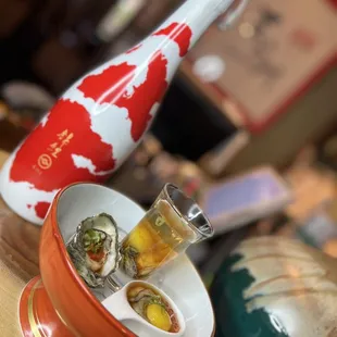 Sake drinks and oyster uni shooters