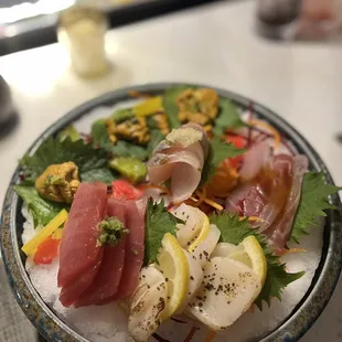 Sashimi platter: Tuna, Uni, Yellowtail Scallion, Scallop