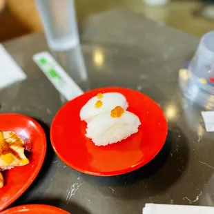 three plates of food on a table