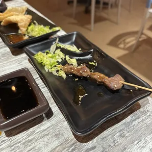 Undercooked slimy runt steak skewer