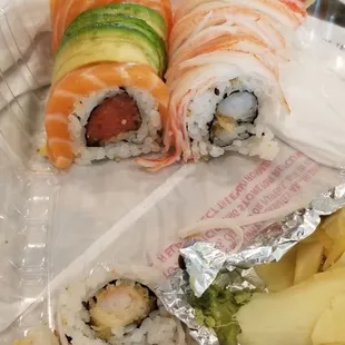 Lucky roll (spicy tuna with salmon, avocado) &amp; Shaggy dog. Too much rice especially the latter. Oddly cut into about 15 thin pieces