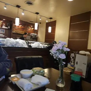 Overall view of the untidy sushi bar area.