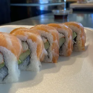 sushi rolls on a white plate