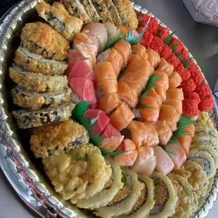 a platter of sushi on a table