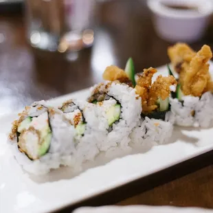 a close up of a plate of sushi