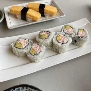 Real crab California roll. Tamago sushi.