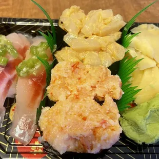 Stripe Bass Sushi (left), Spicy Scallop Sushi (upper right) and Spicy Lobster Sushi (lower right)