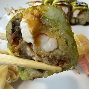 Inside the Fantasy roll- shrimp tempura, eel, avocado, tobiko, cream cheese, wrapped sesame soy paper and eel sauce